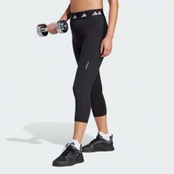 Legginsy Techfit Capri. Białe legginsy adidas, bez wzorów, z materiału, sportowe. Za 169.55 zł.