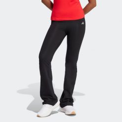 Legginsy fitness damskie ADIDAS flare. Czarne legginsy adidas, bez wzorów, z bawełny, sportowe. Za 149.99 zł.