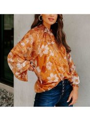 Milan Kiss Bluzka w kolorze pomarańczowym rozmiar: L. Pomarańczowe bluzki Milan Kiss, l, bez wzorów, bez kołnierzyka, bez ramiączek. Za 115.95 zł.