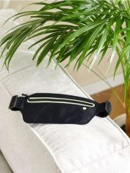 Saszetka z odblaskowymi elementami - czarny. Czarne nerki i saszetki Sinsay, bez wzorów, sportowe, bez dodatków. Za 13.99 zł.