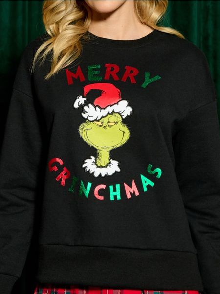 Bluza Grinch - czarny. Czarne bluzy Sinsay, l, z aplikacjami, wizytowe, bez ramiączek, bez kaptura. Za 49.99 zł.