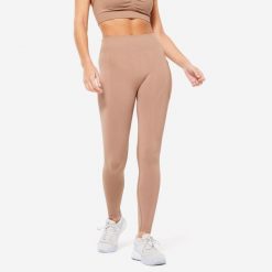 Legginsy fitness damskie Domyos Push Up. Brązowe legginsy DOMYOS, bez wzorów, z elastanu, sportowe. W wyprzedaży za 39.99 zł.