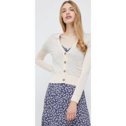 Calvin Klein kardigan wełniany damski kolor beżowy lekki. Brązowe swetry Calvin Klein, l, bez wzorów, z dzianiny, bez ramiączek. W wyprzedaży za 559.99 zł.