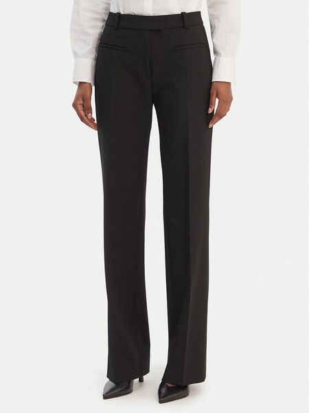 HUGO Spodnie materiałowe Hilayla 50555896 Czarny Slim Fit. Czarne spodnie materiałowe Hugo, bez wzorów, z materiału. Za 749.99 zł.