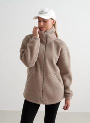 Damska kurtka z polarową podszewką, oversize'owa, Pile Jacket ciemna glina. Brązowe kurtki AIM'N, xl, bez wzorów, z materiału, bez kaptura. Za 603.00 zł.
