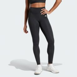 Legginsy Optime Essentials Stay In Play Full-Length. Czarne bielizna termoaktywna damska adidas, bez wzorów, z materiału. Za 279.00 zł.