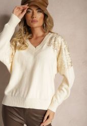 Jasnobeżowy Sweter o Kroju Nietoperza Ozdobiony Cekinami i Cyrkoniami Nevarraea. Brązowe swetry Renee, z aplikacjami, z jeansu, casualowe, bez ramiączek. W wyprzedaży za 111.99 zł.