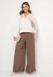 Brązowe Szerokie Garniturowe Spodnie z Wysokim Stanem i Paskiem Haliniela. Brązowe jeansy Born2be, m, bez wzorów, z jeansu, eleganckie, z podwyższonym stanem. W wyprzedaży za 135.99 zł.