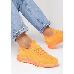 Pomarańczowe Buty Sportowe Haritte. Brązowe buty treningowe Born2be, bez wzorów, z gumy, bez zapięcia. W wyprzedaży za 87.99 zł.