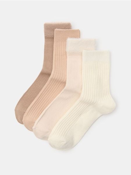 Długie prążkowane skarpety 4 pack - beżowy. Brązowe skarpetki Sinsay, bez wzorów, prążkowane. Za 17.99 zł.