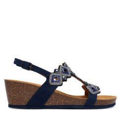 Sandały Scholl. Niebieskie sandały Scholl, bez wzorów, bez obcasa, na koturnie, bez zapięcia. Za 449.99 zł.