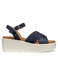 Sandały Geox. Niebieskie sandały Geox, bez wzorów, bez obcasa, na koturnie, bez zapięcia. Za 569.99 zł.