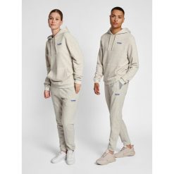 Jogging Hummel GC Austin. Niebieskie spodnie sportowe Hummel, bez wzorów, z tkaniny, do biegania. Za 234.00 zł.