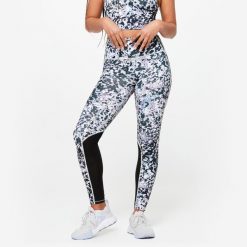 Legginsy fitness damskie Domyos. Czarne legginsy DOMYOS, bez wzorów, z materiału, sportowe. Za 99.99 zł.