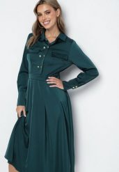 Zielona Rozkloszowana Sukienka o Koszulowym Kroju z Imitacją Kieszeni i Gumką w Talii Rizza. Zielone sukienki Born2be, na co dzień, l, bez wzorów, eleganckie, bez kołnierzyka, bez ramiączek, midi, koszulowe. W wyprzedaży za 132.99 zł.