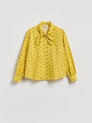 Koszula z kwiatowym motywem - żółty. Żółte koszule Reserved, l, bez wzorów, z bawełny, bez kołnierzyka, bez ramiączek. Za 129.99 zł.