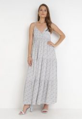 Jasnoniebieska Sukienka Karuen. Niebieskie sukienki Born2be, l, bez wzorów, z tkaniny, wakacyjne, bez kołnierzyka, bez ramiączek, maxi, kopertowe. Za 139.99 zł.