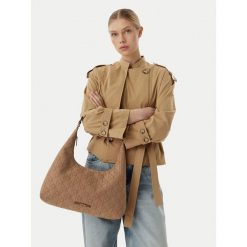 Torebka Calvin Klein. Brązowe torebki klasyczne Calvin Klein, bez wzorów, klasyczne, bez dodatków. Za 569.99 zł.