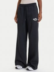 New Balance Spodnie dresowe WP53902 Czarny Relaxed Fit. Czarne spodnie dresowe New Balance, bez wzorów, z dresówki. Za 276.40 zł.