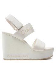 Calvin Klein Jeans Sandały Wedge Sandal Webbing In Mr YW0YW01360 Biały. Białe sandały Calvin Klein Jeans, bez wzorów, z jeansu, bez obcasa, na koturnie, bez zapięcia. Za 369.99 zł.