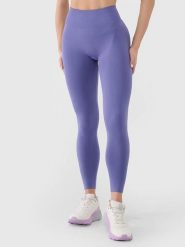 4F Legginsy funkcyjne w kolorze fioletowym rozmiar: M/L. Różowe legginsy 4f, l, bez wzorów, z materiału, na fitness i siłownię. Za 84.60 zł.