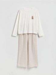 Dwuczęściowa piżama z nadrukiem - beżowy. Brązowe piżamy Reserved, l, bez wzorów, z bawełny, bez kołnierzyka, bez ramiączek. Za 139.99 zł.