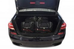 Torby Do Bagażnika Bmw 7 2015-2022 4Szt Kjust. Czarne torby podróżne KJUST, bez wzorów, z kauczuku. Za 1,249.00 zł.