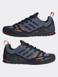 Adidas Buty trekkingowe w kolorze czarno-pomarańczowo-niebieskim rozmiar: 47. Czarne trekkingi adidas, bez wzorów, bez zapięcia, outdoorowe. Za 402.45 zł.