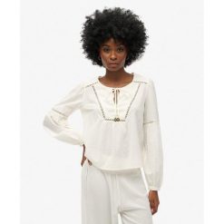 Bluzka plażowa z długim rękawem Ibiza. Białe bielizna termoaktywna damska Superdry, bez wzorów, bez ramiączek. Za 332.85 zł.