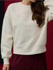 Bluza crewneck oversize z napisem - kremowy. Białe bluzy Sinsay, l, bez wzorów, bez ramiączek, bez kaptura. Za 45.99 zł.
