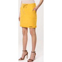 Żółta Spódnica Oppugn. Spódnice marki Born2be. Za 49.99 zł.