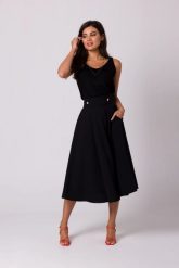 Rozkloszowana spódnica z wysokim stanem i kieszeniami czarna. Czarne spódnice Bewear, m, bez wzorów, midi, rozkloszowane. Za 319.00 zł.