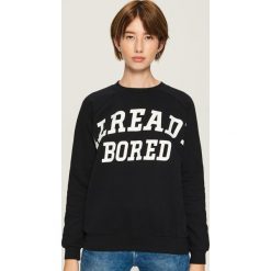 Bluza z napisem - Czarny. Bluzy marki KALENJI. W wyprzedaży za 29.99 zł.