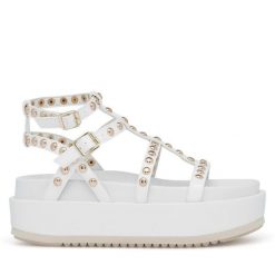 Sandały Badura. Białe sandały Badura, bez wzorów, bez obcasa, na koturnie, bez zapięcia. Za 229.99 zł.