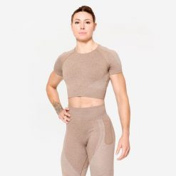 Koszulka fitness damska Domyos krótki rękaw crop top. Brązowe biustonosze DOMYOS, bez wzorów, z materiału. Za 79.99 zł.