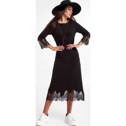 Sukienka TWINSET. Czarne sukienki Twinset Milano, xs, bez wzorów, z dzianiny, bez kołnierzyka, bez ramiączek, midi. Za 1,119.00 zł.