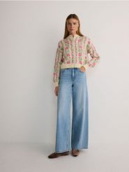 Wzorzysty kardigan - wielobarwny. Swetry Reserved, l, bez wzorów, z dzianiny, bez ramiączek. W wyprzedaży za 119.99 zł.