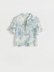 Wzorzysta bluzka - jasnoniebieski. Niebieskie bluzki Reserved, l, bez wzorów, z tkaniny, bez kołnierzyka, bez ramiączek. W wyprzedaży za 29.99 zł.