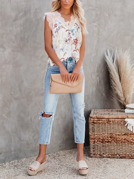 Milan Kiss Bluzka w kolorze kremowym ze wzorem rozmiar: XL. Brązowe bluzki Milan Kiss, xl, bez wzorów, z koronki, bez kołnierzyka, bez ramiączek. Za 114.44 zł.