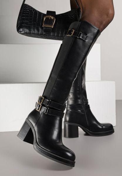 Czarne Kozaki na Słupku Zdobione Paskami z Klamrami i Elastyczną Wstawką Unelisa. Czarne kozaki Born2be, z aplikacjami, z jeansu, biznesowe, bez obcasa, na obcasie, bez zapięcia. Za 209.99 zł.