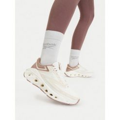 Buty do biegania Reebok. Białe buty do biegania Reebok, bez wzorów, bez zapięcia, do biegania. Za 349.99 zł.