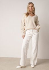 Białe Szerokie Jeansy z Bawełną Zdobione Przeszyciami w Romby Biretha. Białe jeansy Born2be, l, z aplikacjami, z bawełny, eleganckie, z podwyższonym stanem. Za 109.99 zł.