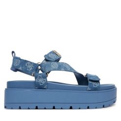 Sandały Guess. Niebieskie sandały Guess, z aplikacjami, bez obcasa, na płaskiej podeszwie, bez zapięcia. Za 559.99 zł.