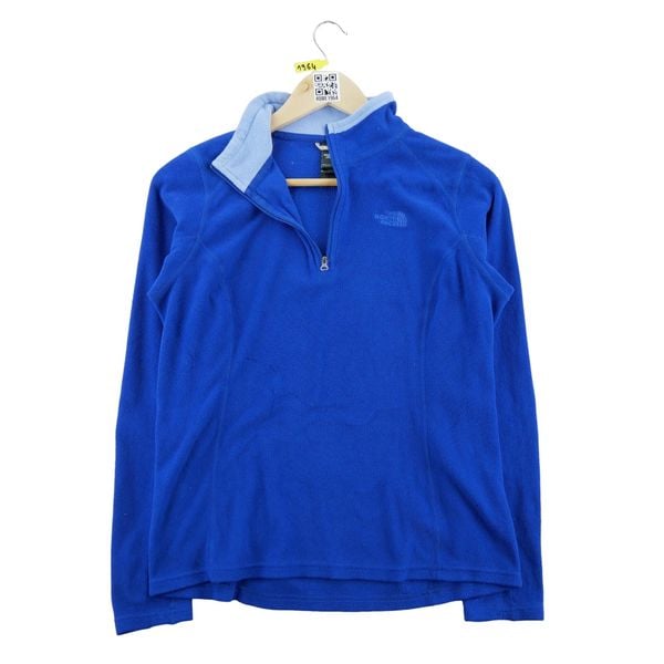 The North Face bluza polar damska. Niebieskie bluzy bez kaptura The North Face, l, bez wzorów, z materiału, bez kaptura, trekkingowe. Za 106.46 zł.