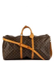 Louis Vuitton Torba podróżna w kolorze brązowym - 60 x 33 x 26 cm rozmiar: onesize. Brązowe torby podróżne Louis Vuitton, bez wzorów, z materiału, przez ramię. Za 5,842.99 zł.