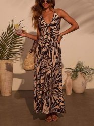 Milan Kiss Sukienka w kolorze jasnobrązowo-czarnym rozmiar: M. Brązowe sukienki Milan Kiss, na imprezę, m, bez wzorów, z wiskozy, bez kołnierzyka, bez ramiączek, maxi. Za 201.55 zł.