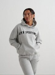 Damska bluza z kapturem, drapany polar, luźny Varsity Sweat Hood szary melanż. Szare bluzy z kapturem AIM'N, l, bez wzorów, z bawełny, z kapturem, na fitness i siłownię. Za 339.00 zł.