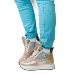 Złote ocieplane sneakersy z brokatem Deleon złoty. Żółte botki bez wzorów, eleganckie, z okrągłym noskiem, przed kolano, bez obcasa, bez zapięcia. Za 169.07 zł.