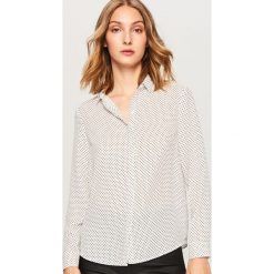 Koszula w kropki - Biały. Koszule marki QUECHUA. W wyprzedaży za 49.99 zł.