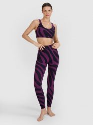 4F Legginsy do jogi i pilatesu szybkoschnące damskie - fioletowe M. Fioletowe legginsy 4f, bez wzorów, z dzianiny, klasyczne. W wyprzedaży za 99.99 zł.